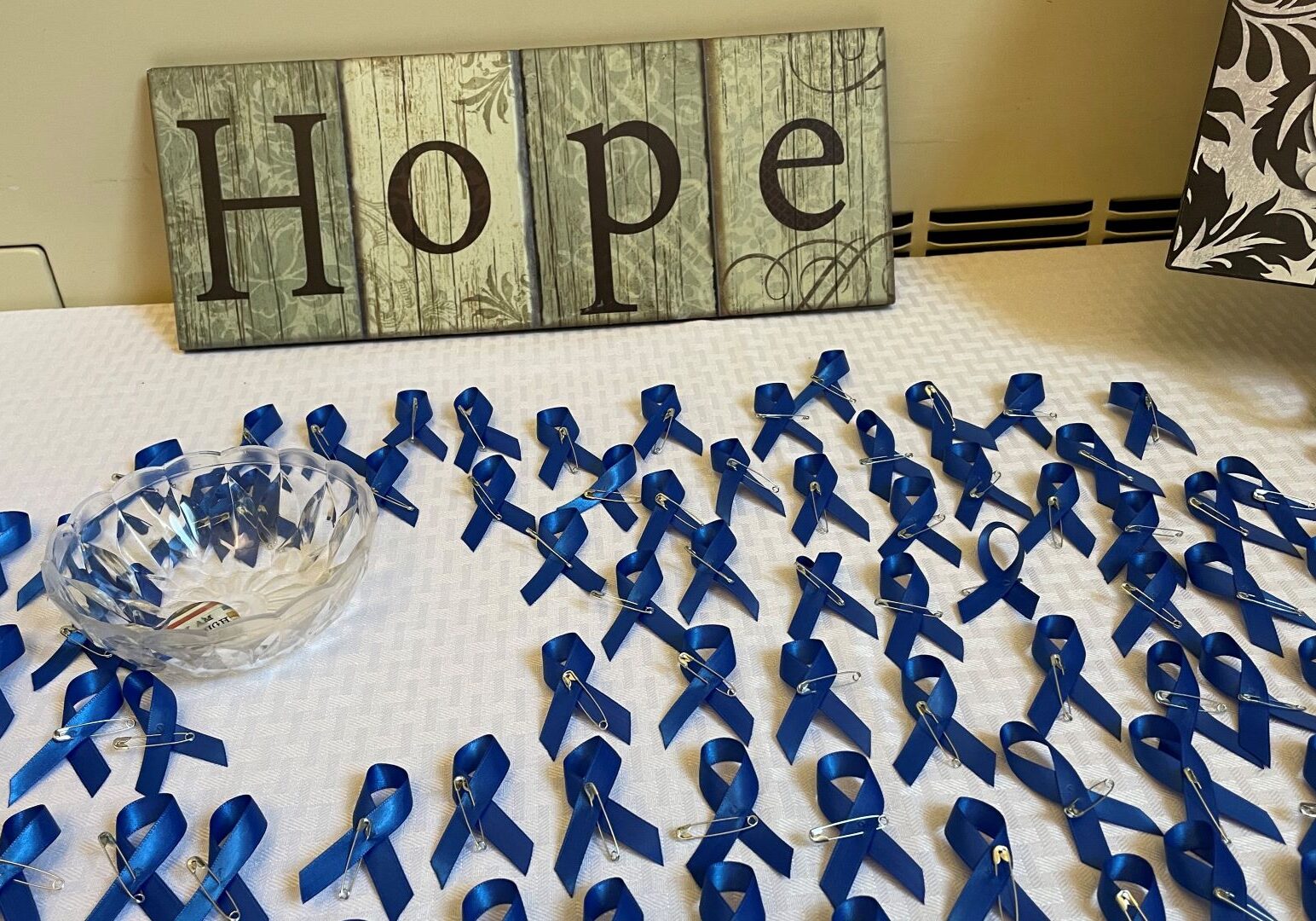 Blue ribbons and pinwheels were part of the displays in the vestibule of the Cathedral of the Immaculate Conception in downtown Kansas City. The items were for those who attended the Diocesan Day of Prayer in Atonement for those Harmed by Sexual Abuse, a service that was led by Bishop James V. Johnston, Jr.