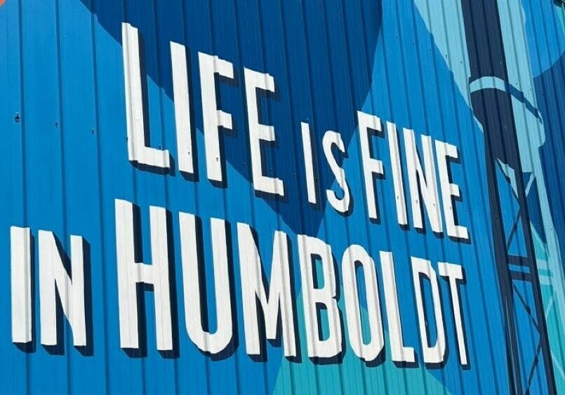 A sign on the side of a building reads "Life is Fine in Humboldt."