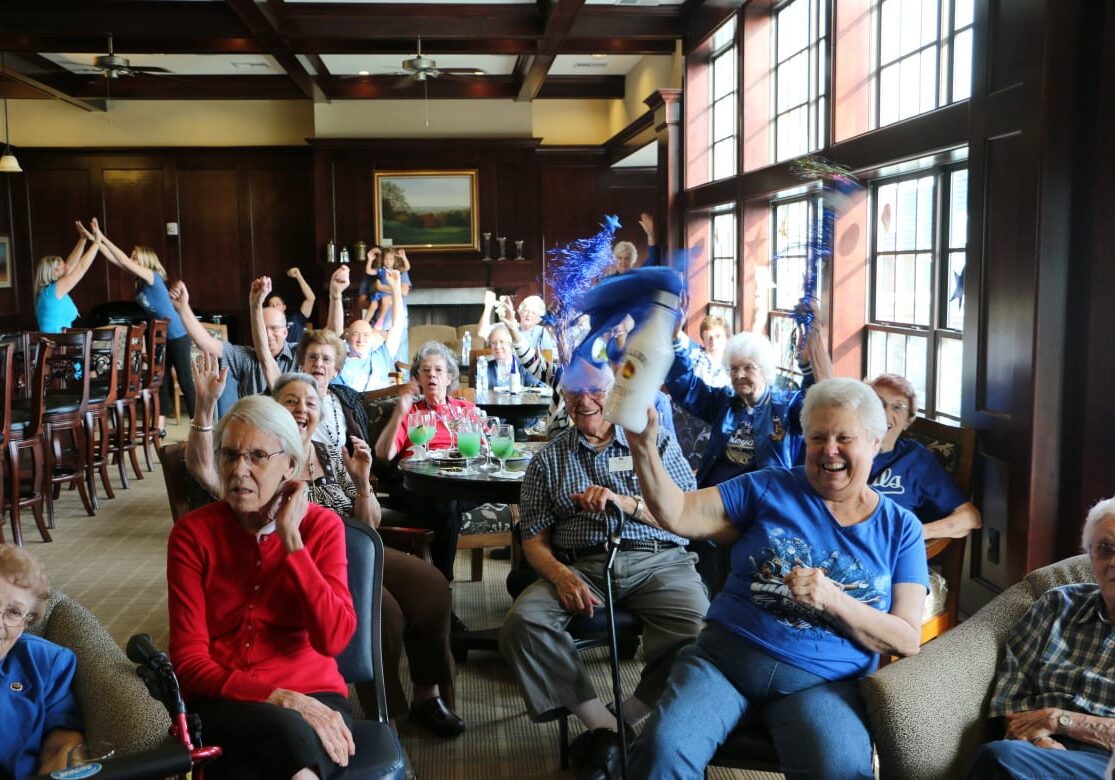 At the McCrite Plaza ALCS watch party, senior citizens showed they are just as fired up about the Royals as anyone else, ahem, maybe more. (Photo: Daniel Boothe | Flatland) . 