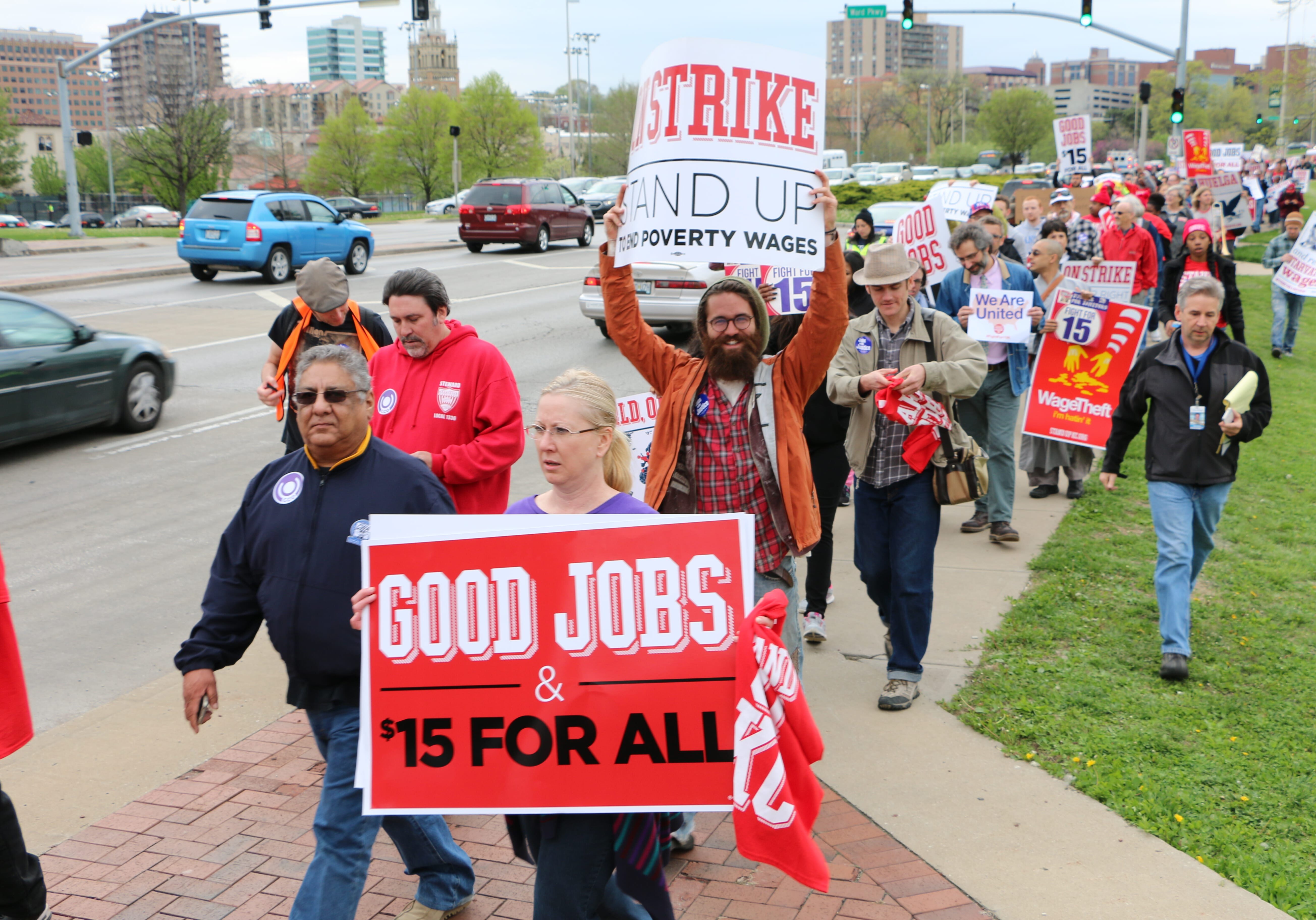Kansas Citians march on the Plaza in support for higher wages.  Photo by Bridgit Bowden