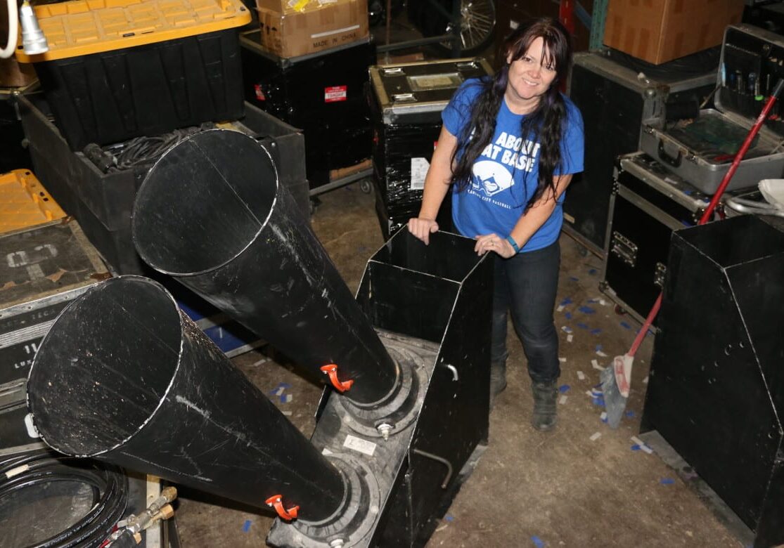 Woman holding a confetti cannon at Visual FX 