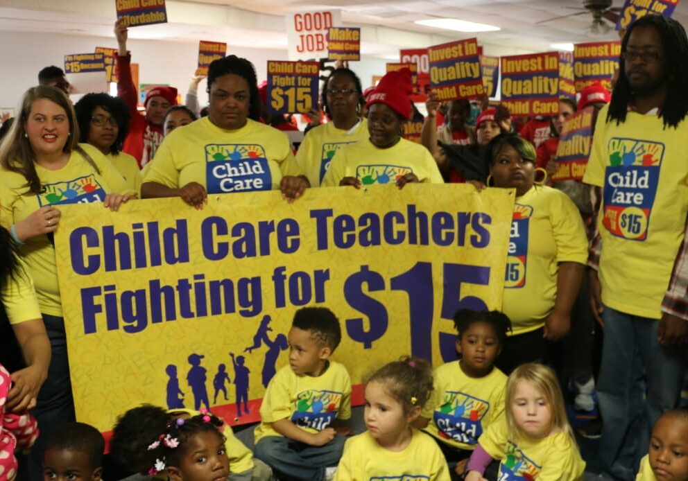 A protest group rallies for a base salary of $15. 