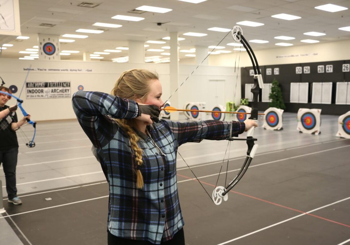 Three-time Missouri State Champion Shelby Winslow practicing archery