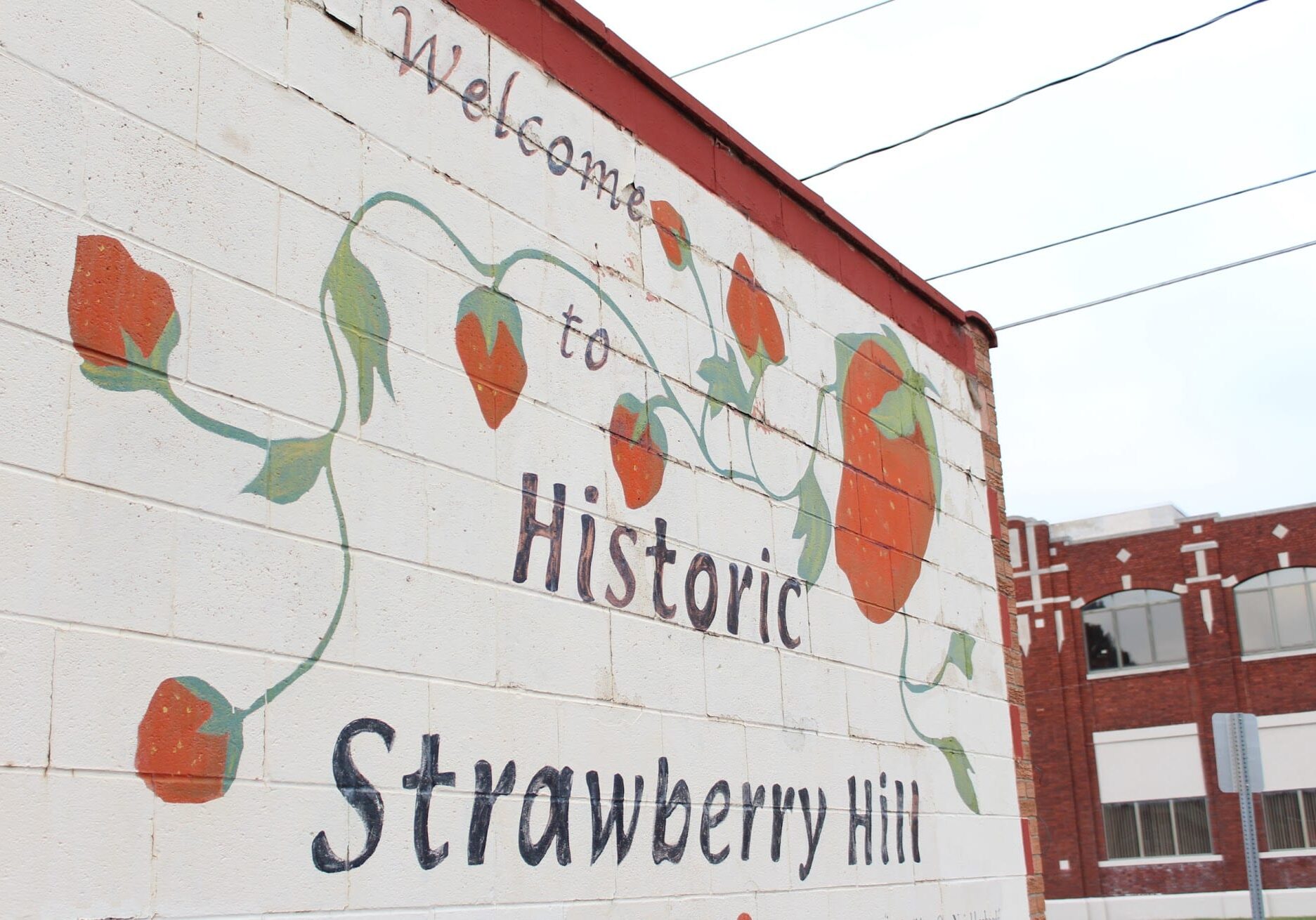 Welcome to Strawberry Hill sign