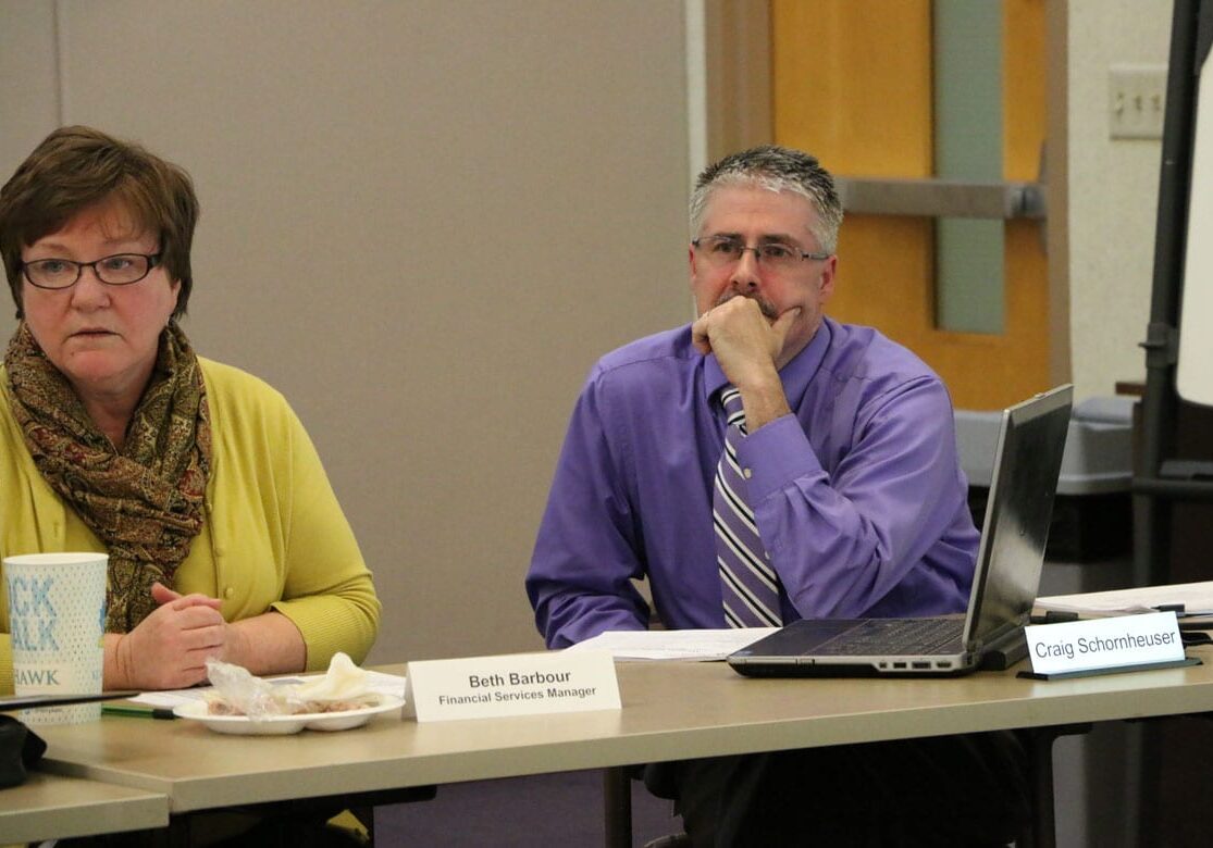 Budget officials at the center answer questions