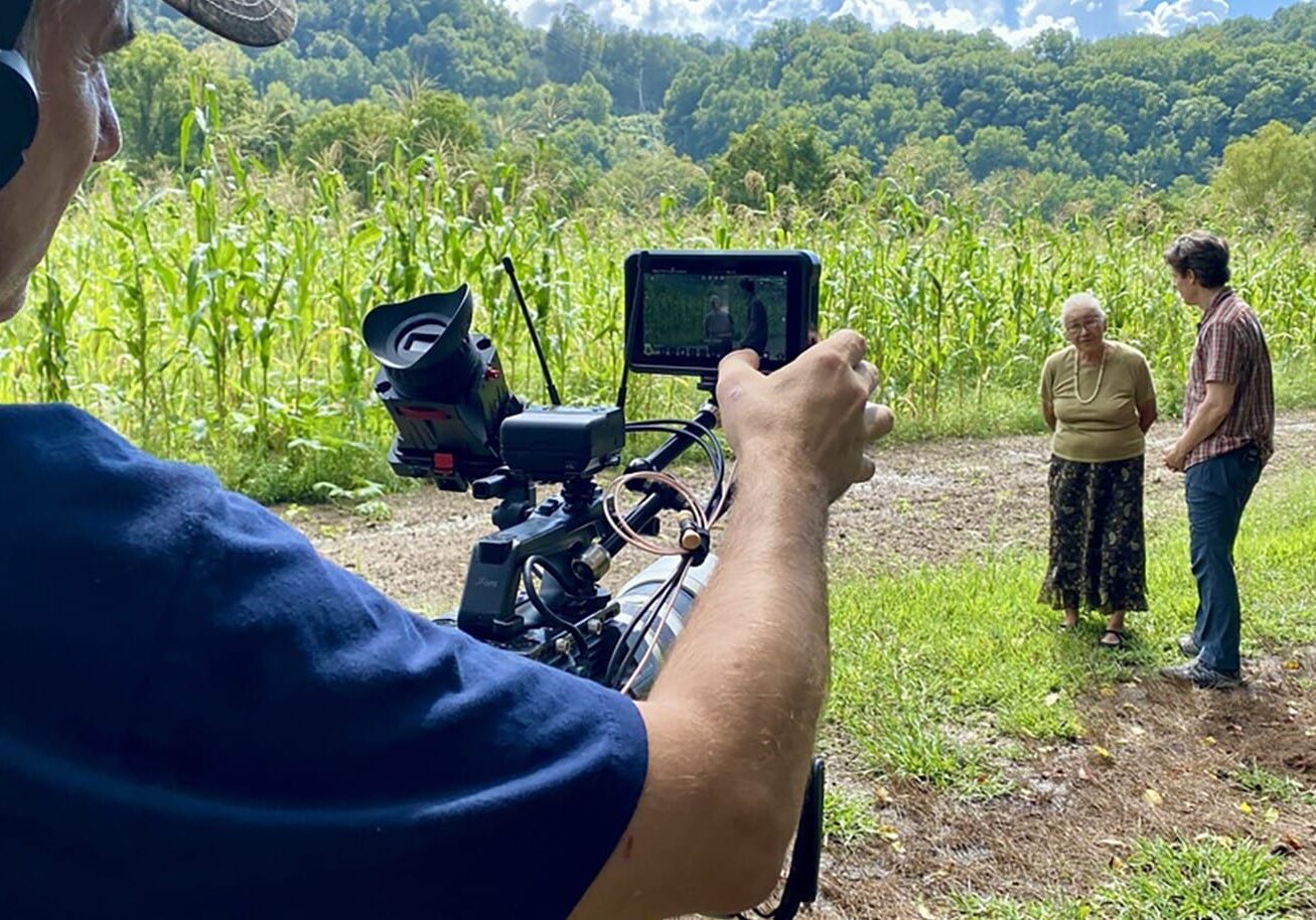 Jim Kane, right, films with Amy Walker "The Spirit Gardener" for an episode of "The Food Principle" on PBS.
