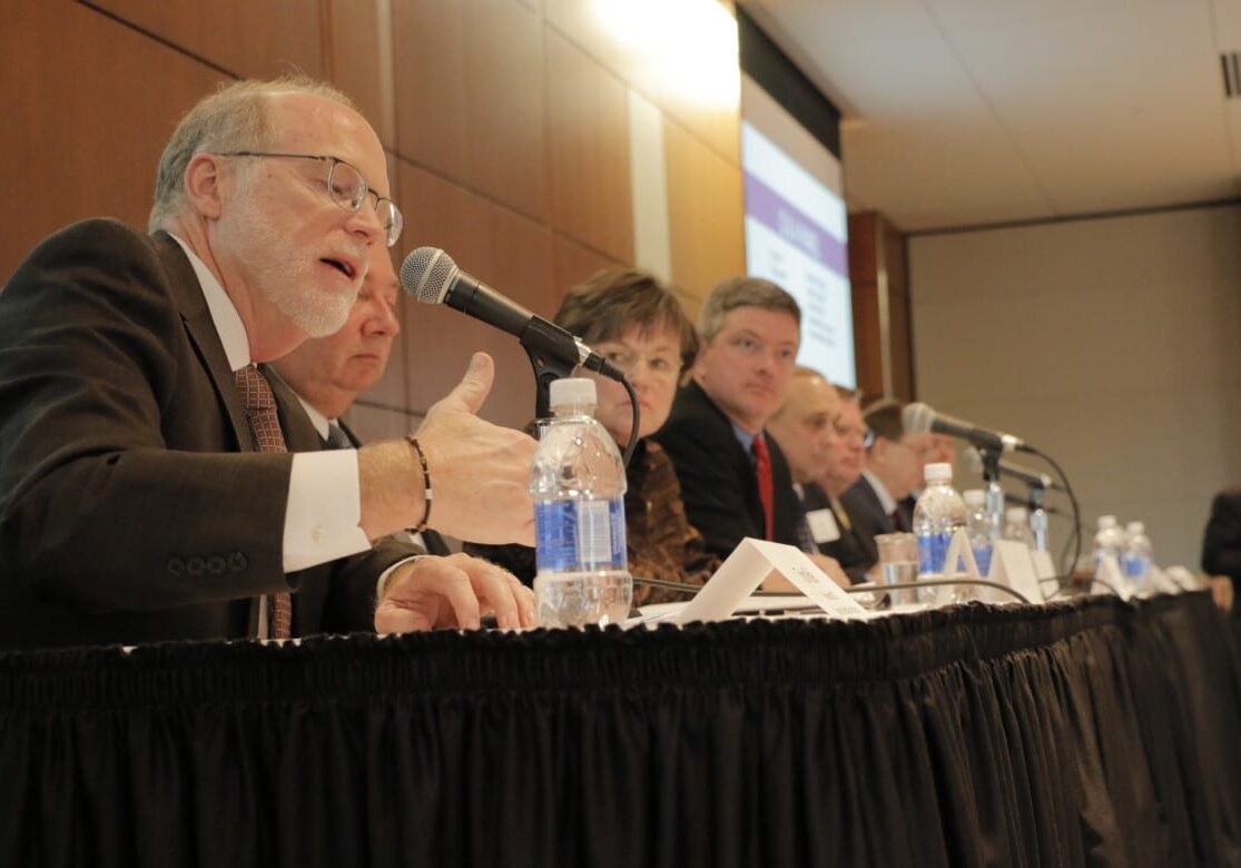 panelist makes a point at the forum