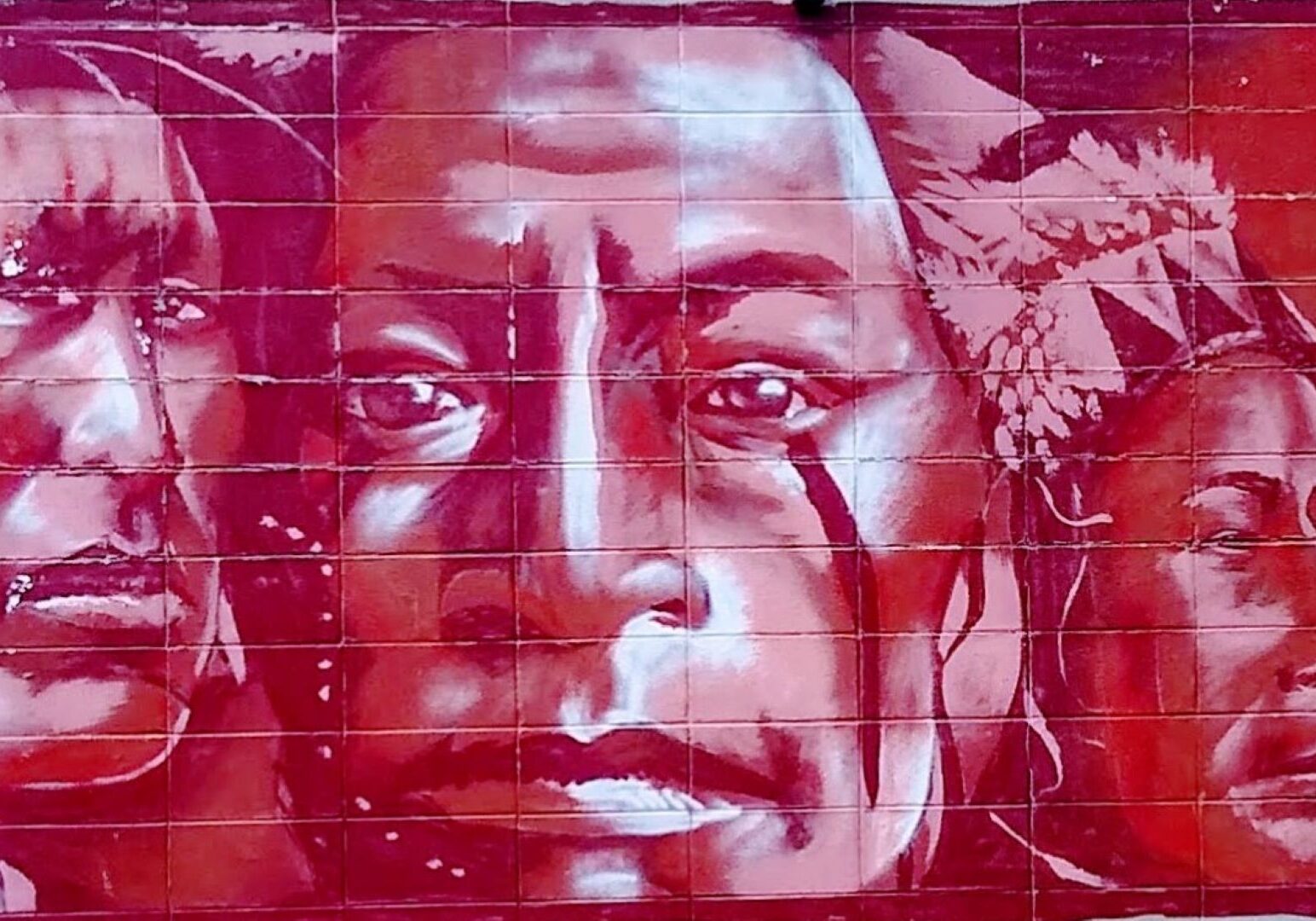 This artwork showing faces of Native Americans is displayed on the east side of the building that houses the Kansas City Indian Center at 600 W. 39th St. in Kansas City.