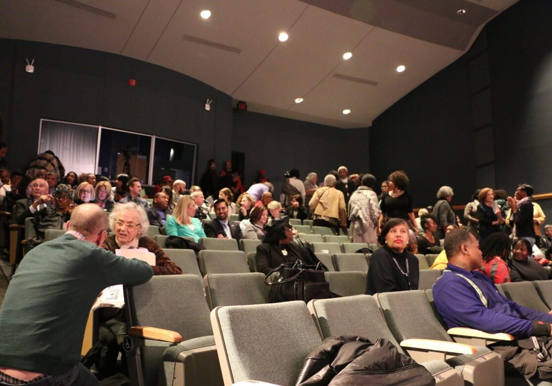 Audience awaits second candidate to take the stage