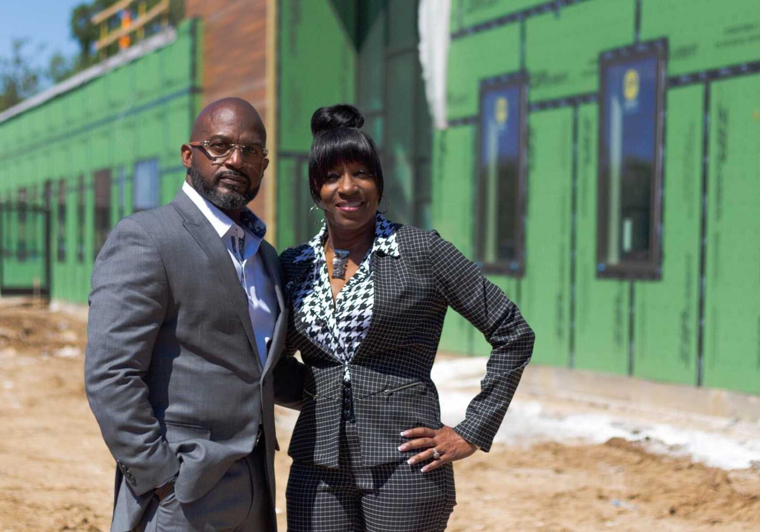 Myron McCant and Penny Dale-McCant pose in front of what will become the new KD Academy.