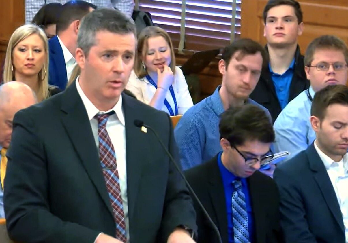 Kansas Budget Director Adam Proffitt addresses a joint hearing of Senate and House lawmakers Thursday to reveal the governor’s budget plan.