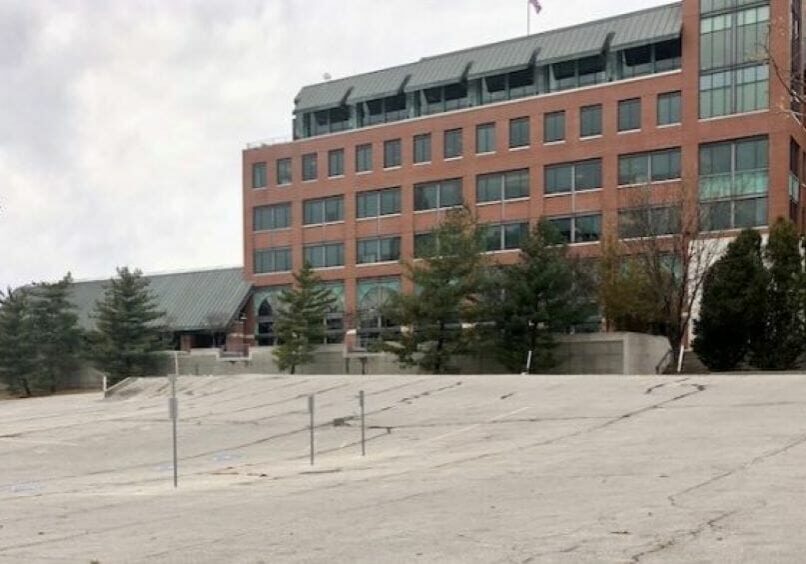 Kansas City Southern headquarters with a city-owned parking lot in the foreground.