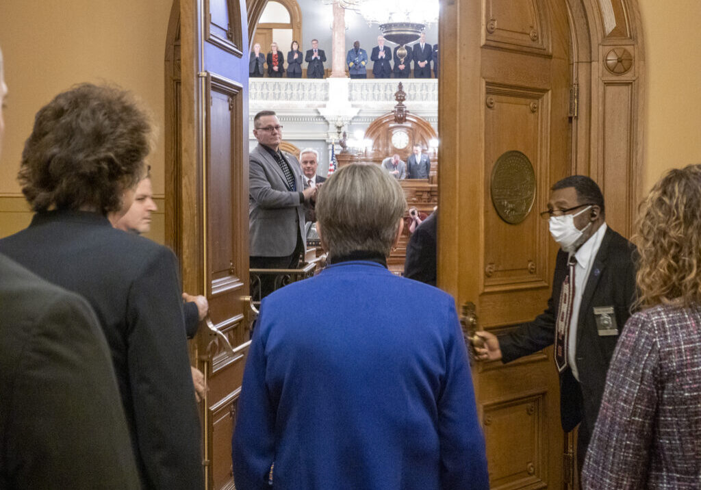Kansas Gov. Laura Kelly enters to deliver the State of the State.