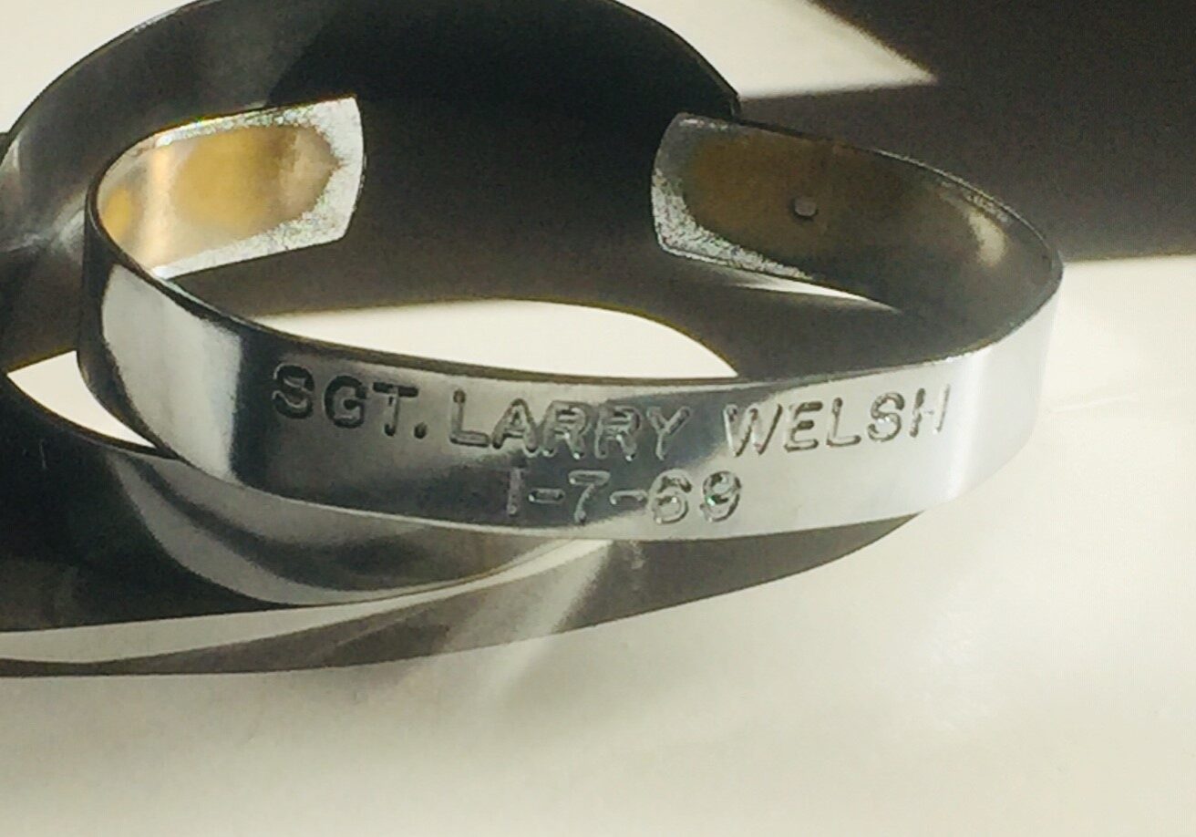 A bracelet honoring Sgt. Larry Welsh of Kansas City, Kansas, who has been missing in action since the Vietnam War.
