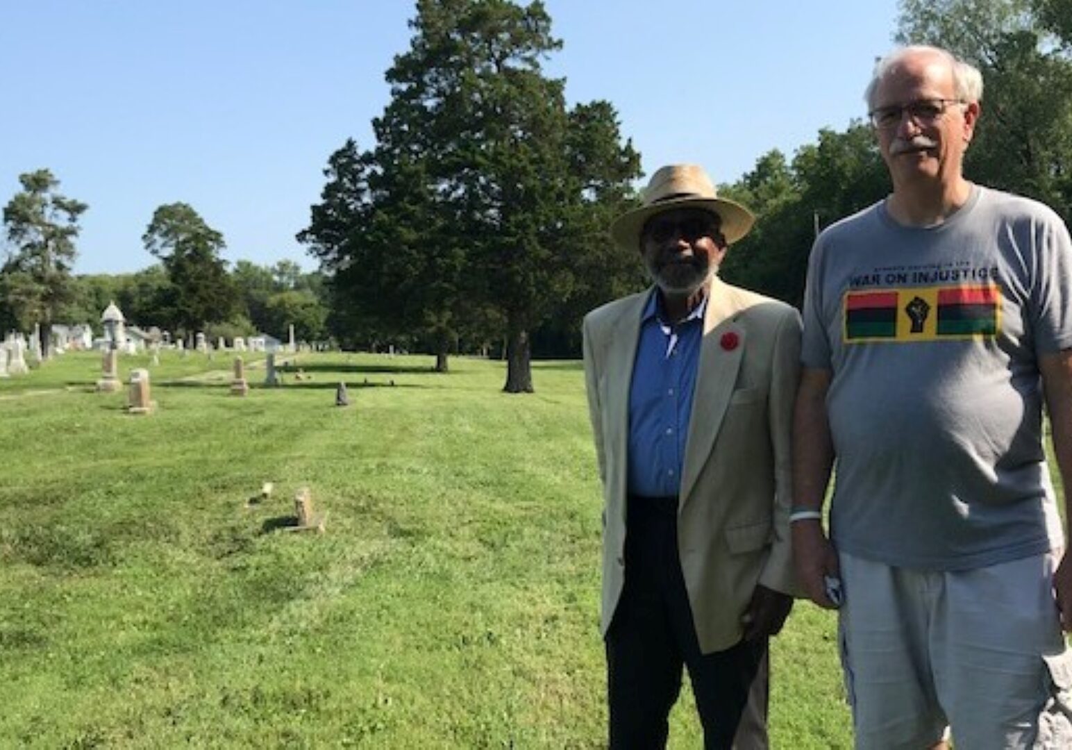 Shelton Ponder (left) and Harold Phillips, co-chairs of the Liberty African American Legacy Memorial project, stand in a formerly segregated portion of Fairview and New Hope Cemetery, where ground will be broken for the memorial on Saturday.