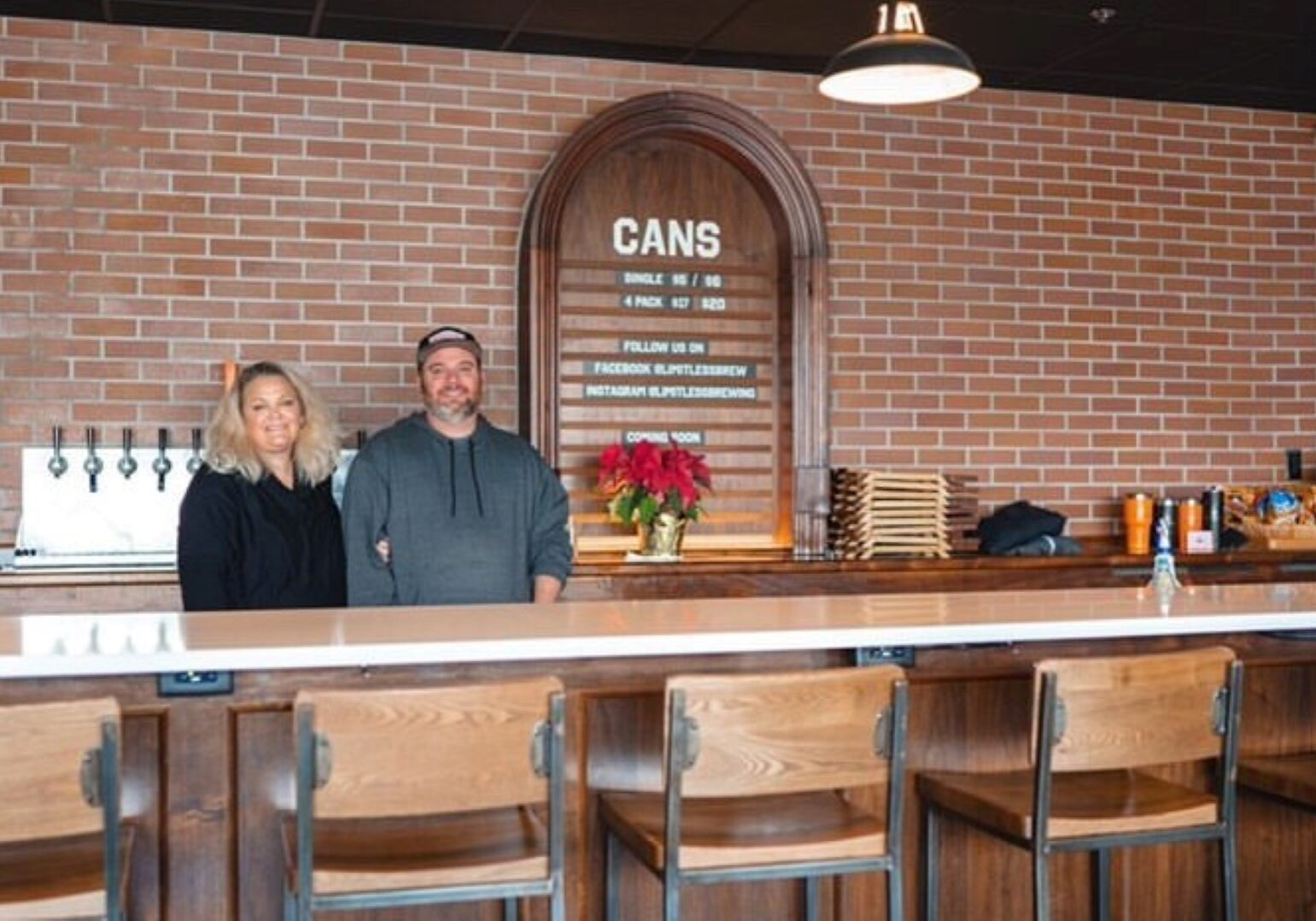 Emily Mobley (left) and Dave Mobley (right), of Limitless Brewing