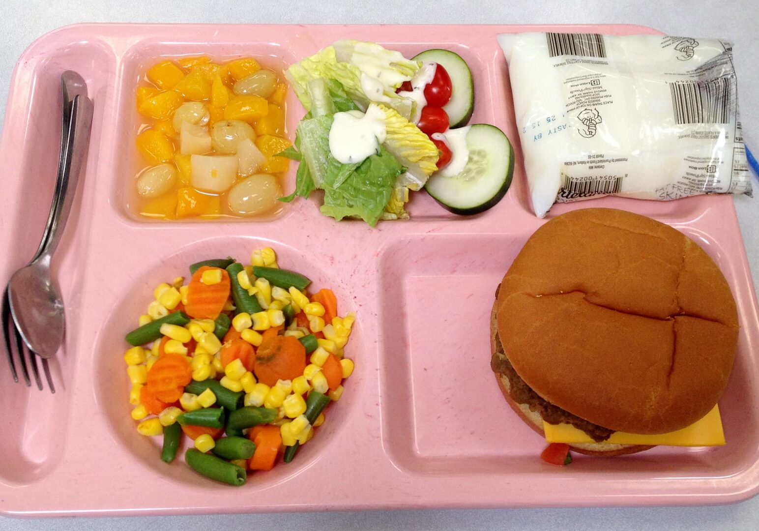 A school lunch tray with food