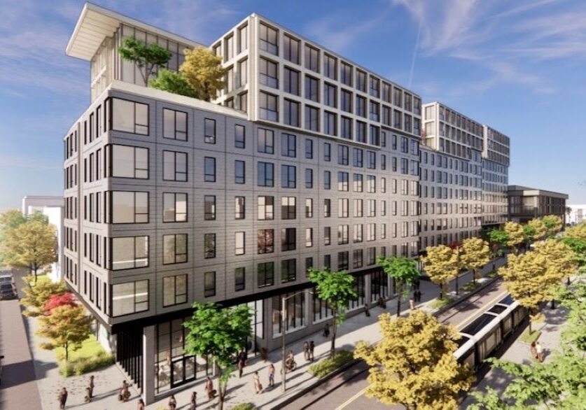 The Mac "1 W. Armour" proposal looking northwest along Main Street with the proposed segmented apartment building in the foreground.