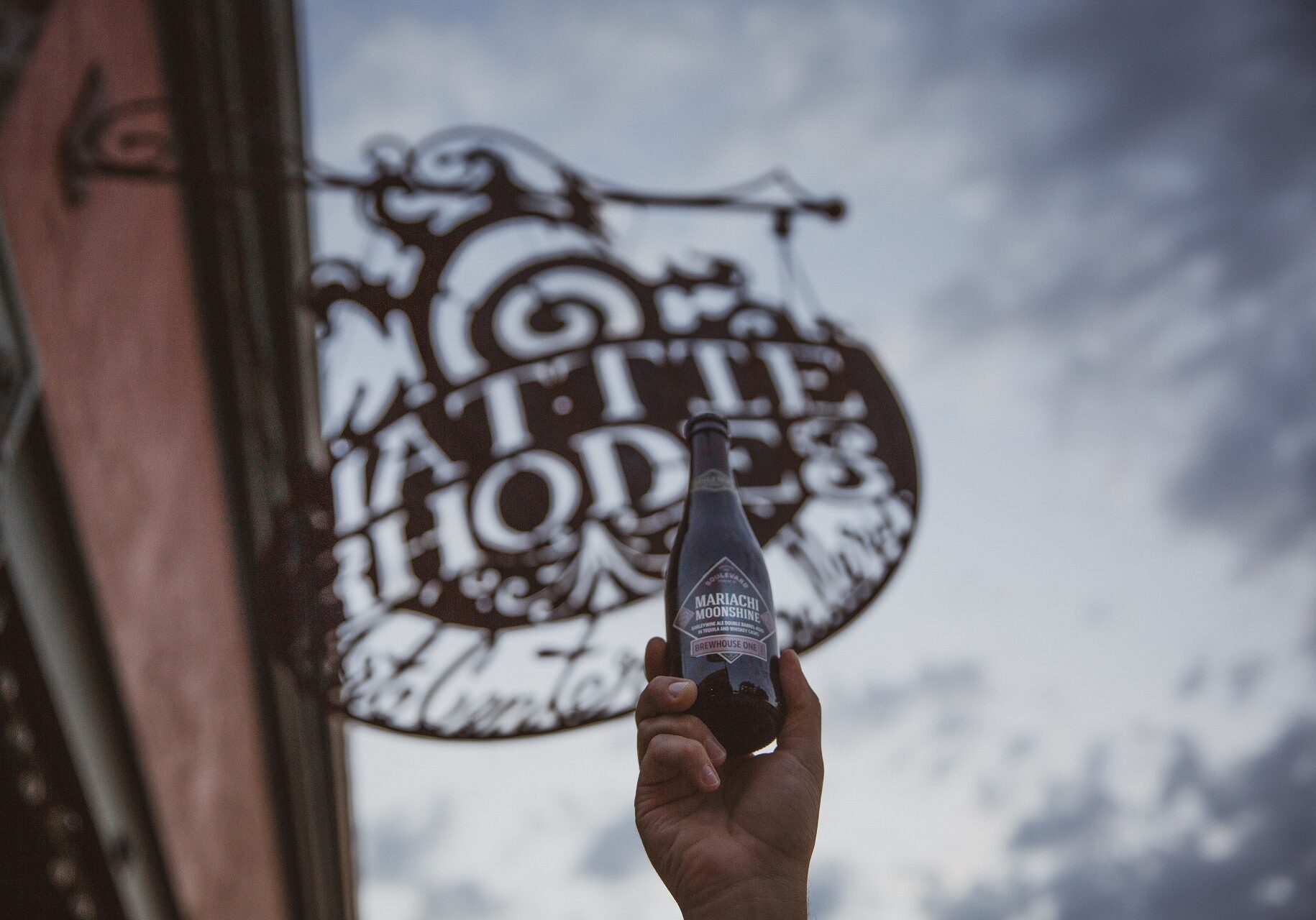 Mariachi Moonshine beer bottle with Mattie Rhodes store sign