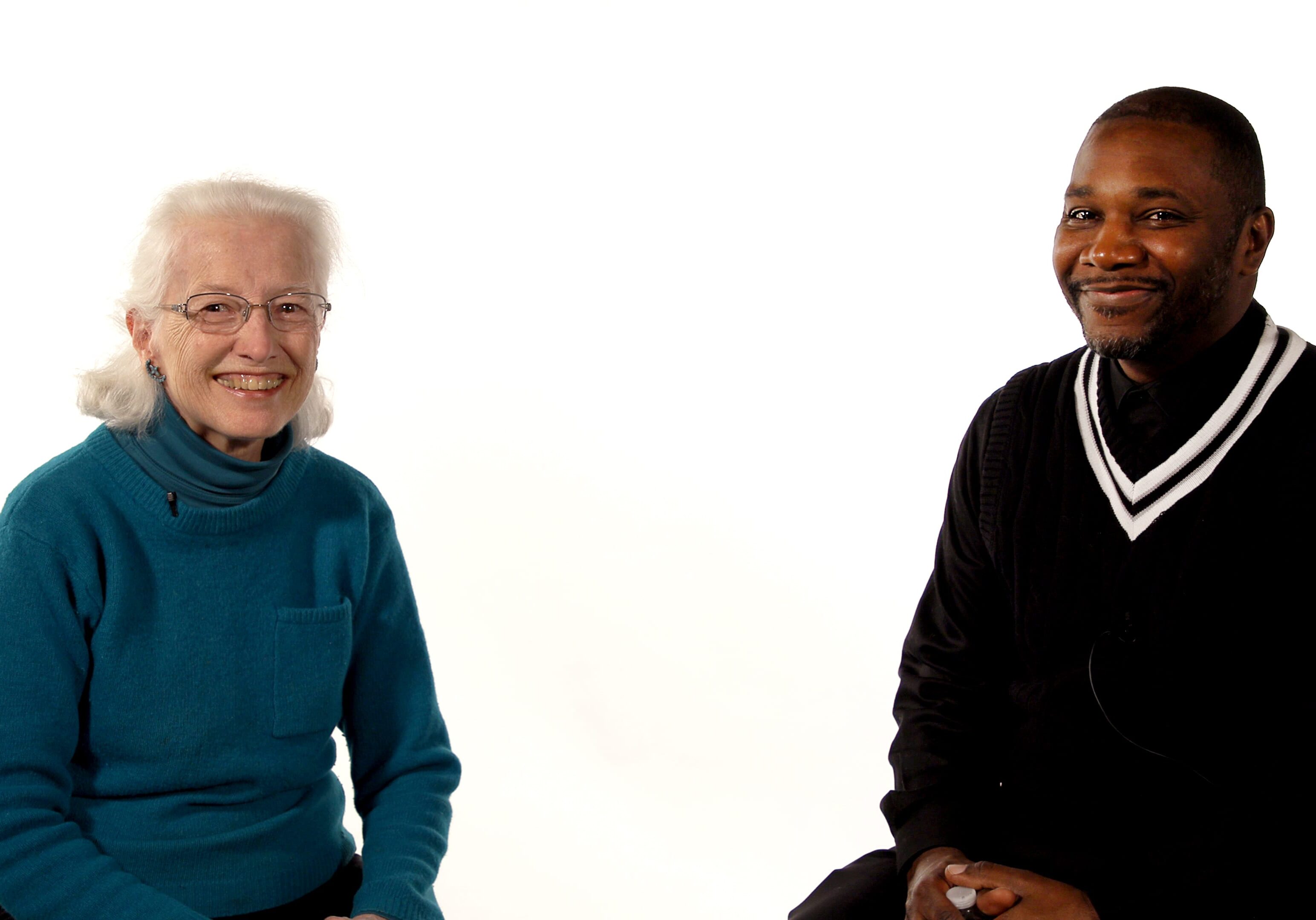 Question asker Marian Thomas with Imam Sulaiman Salaam at the Flatland studios. (Emily Woodring | Flatland)