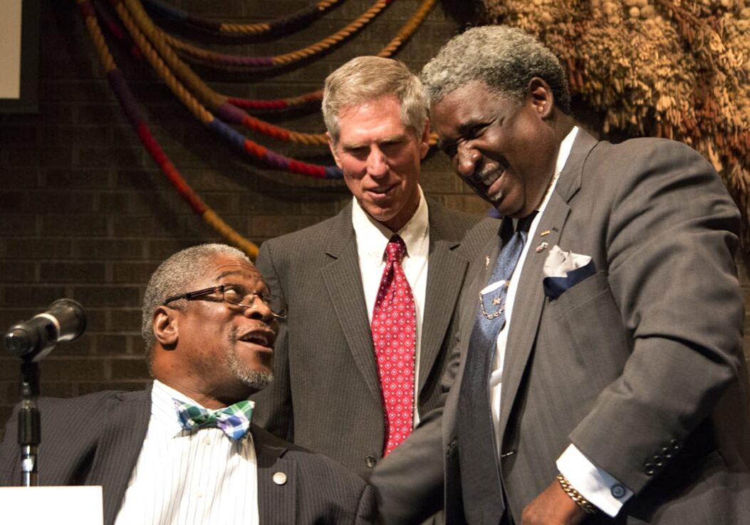 Mayor Sly James (left), Clay Chastain, and Vincent Lee shared a laugh before a 90-minute forum at the All Souls Universalist Church Tuesday, March 24, 2015. The three candidates met together, for the first time, at the event hosted by the League of Women Voters. The primary is April 7. (Photo by Todd Feeback/Hale Center for Journalism)