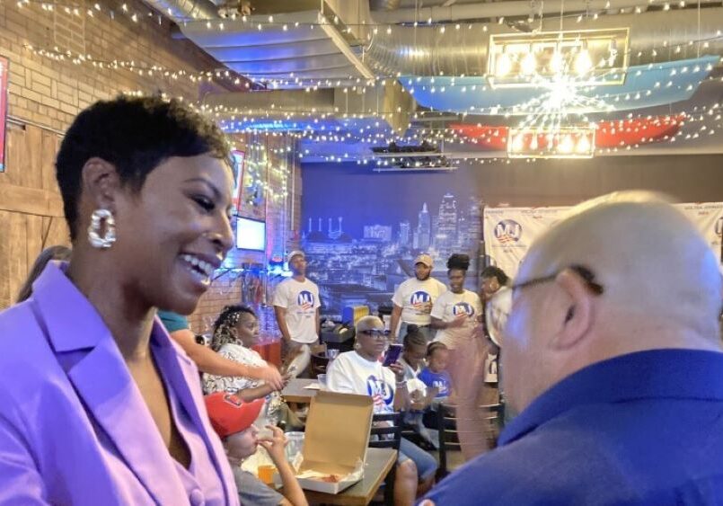 Melesa Johnson greets a supporter.