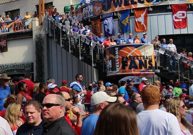 Crowds of people in the Power and Light District during basketball games.