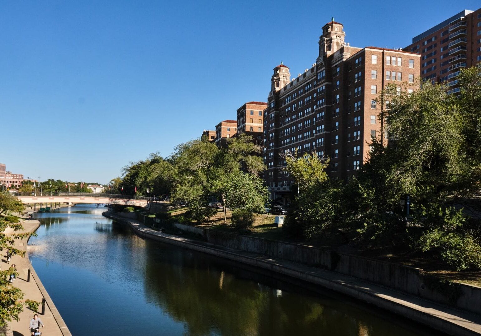 Historic high-rise apartments along the south side of Brush Creek next to the Country Club Plaza.