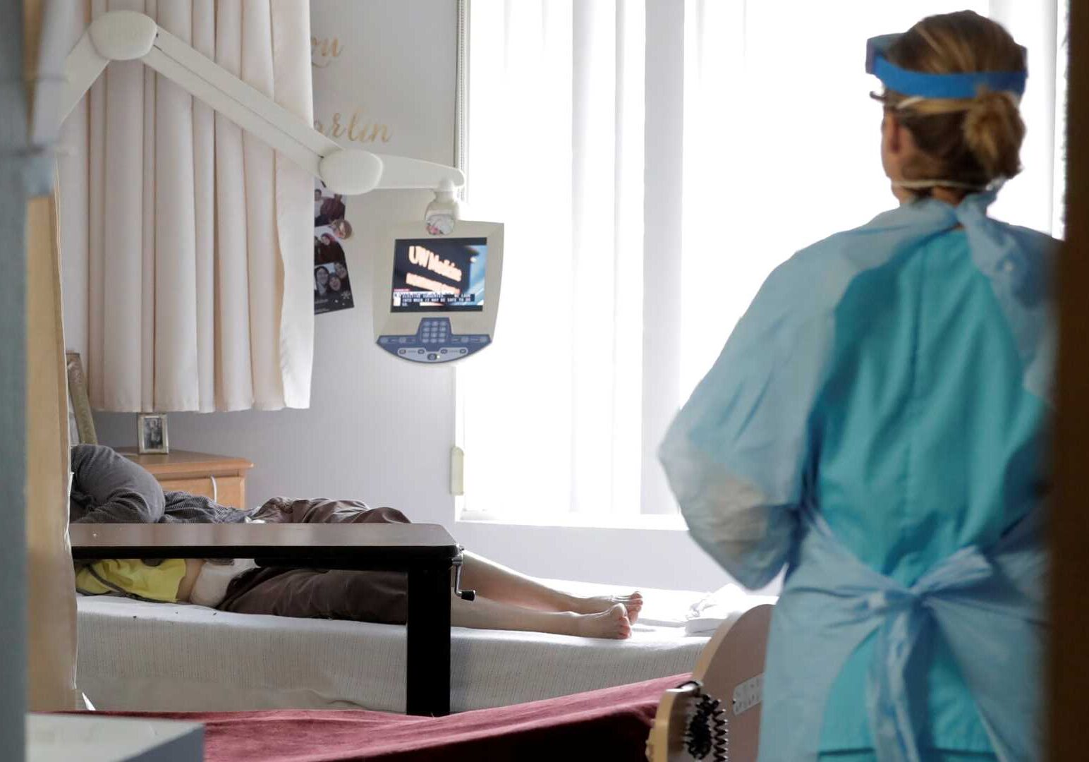 Health care worker with nursing home resident