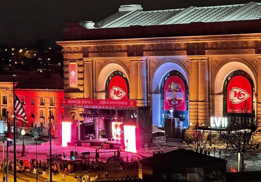 The Union Station stage lit up before dawn on the day of the Kansas City Chiefs Super Bowl championship parade.
