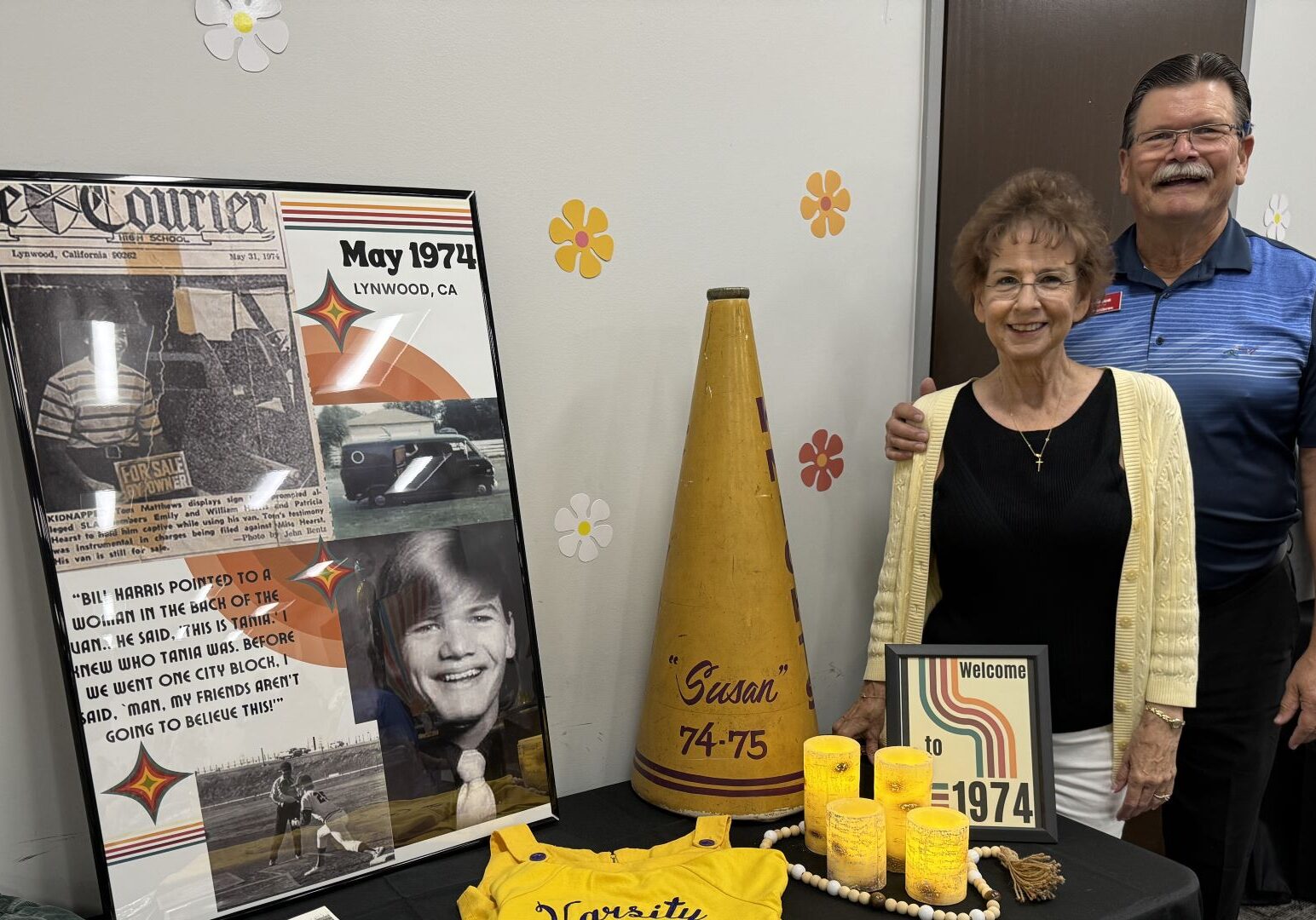 Tom and Susan Matthews stand next to memorabilia from 1974, when Tom was abducted by Patty Hurst and other members of the Symbionese Liberation Army.