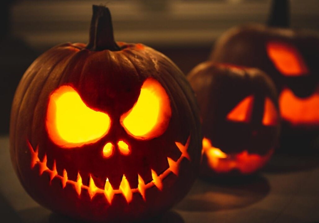 Three scary Halloween pumpkins.