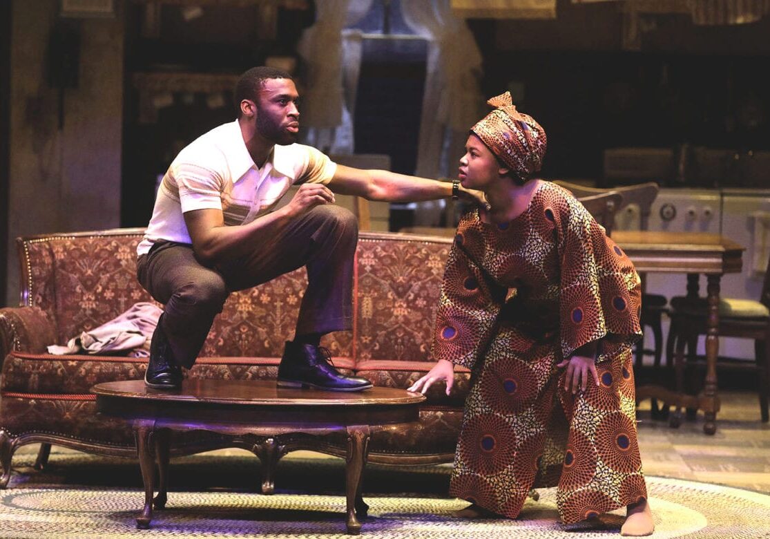 Two individuals dance.