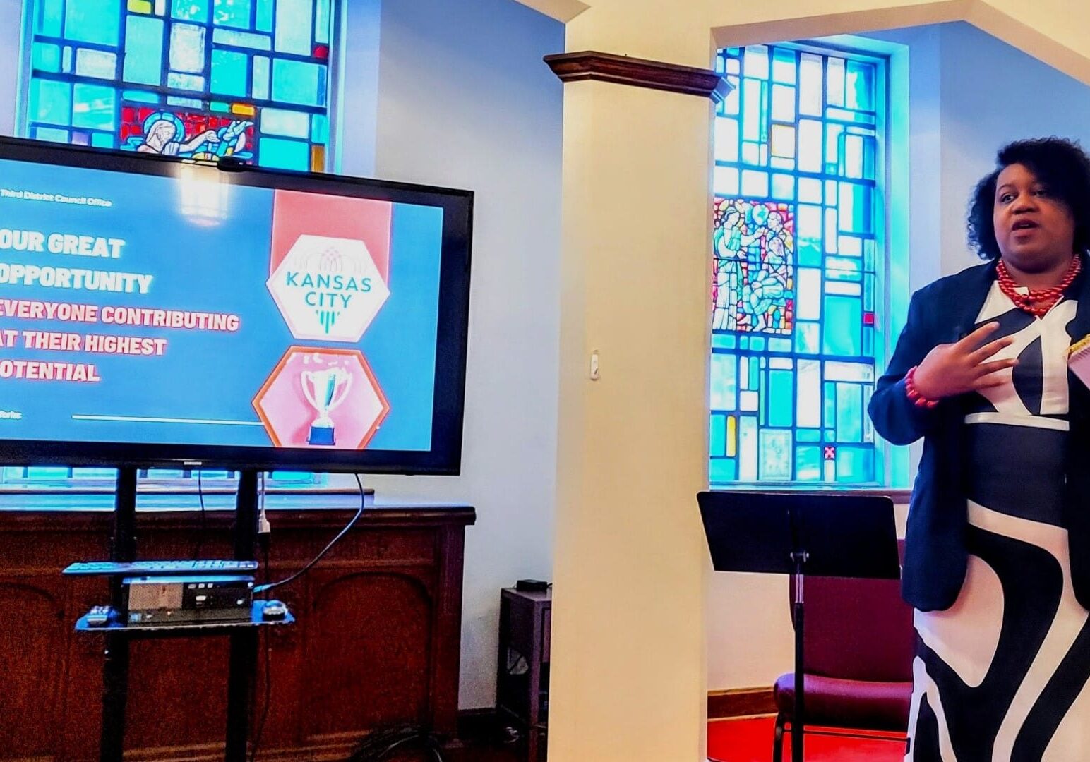Kansas City Councilwoman Melissa Robinson speaks in a church.