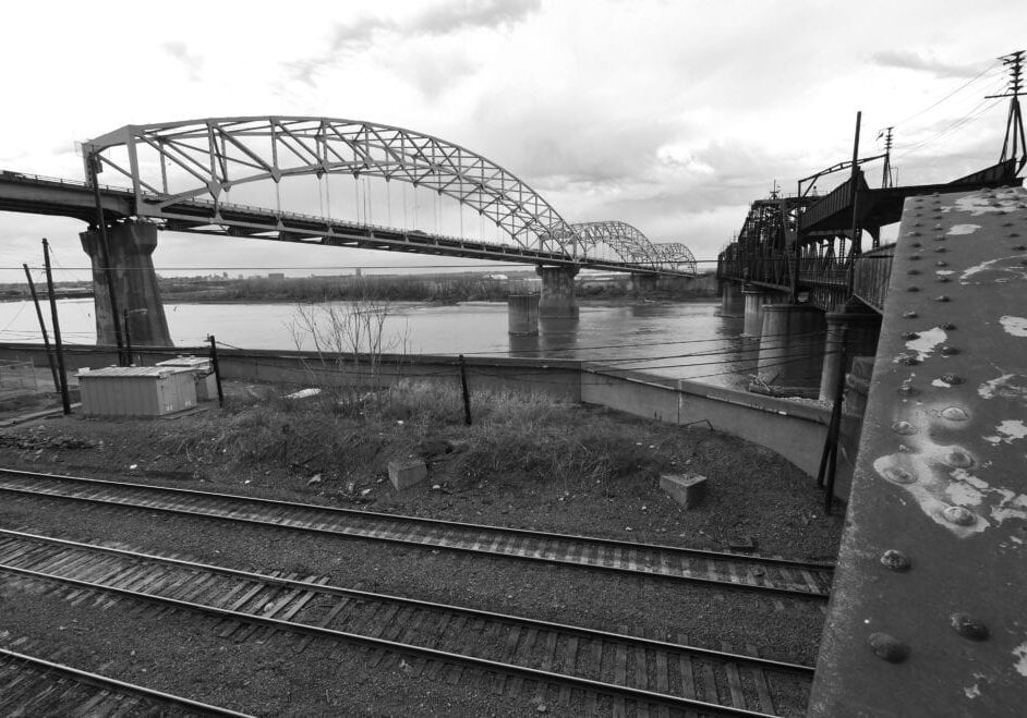 The Buck O'Niel Bridge, left, and Second Hannibal Bridge, right, span the Missouri River.