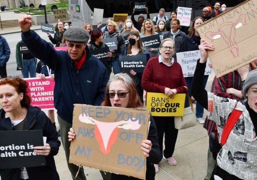 Members of the crowd chant during a rally at the Jackson County Courthouse in Kansas City where protesters gathered after the leaked Supreme Court draft opinion by the U.S. Supreme Court indicating the landmark Roe v. Wade decision will be overturned.