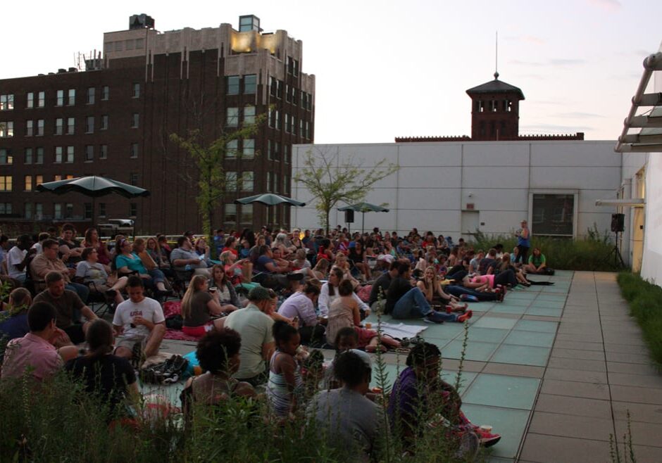 Movie-goers on top of Kansas City Public Library downtown central library for Off the Wall film festival