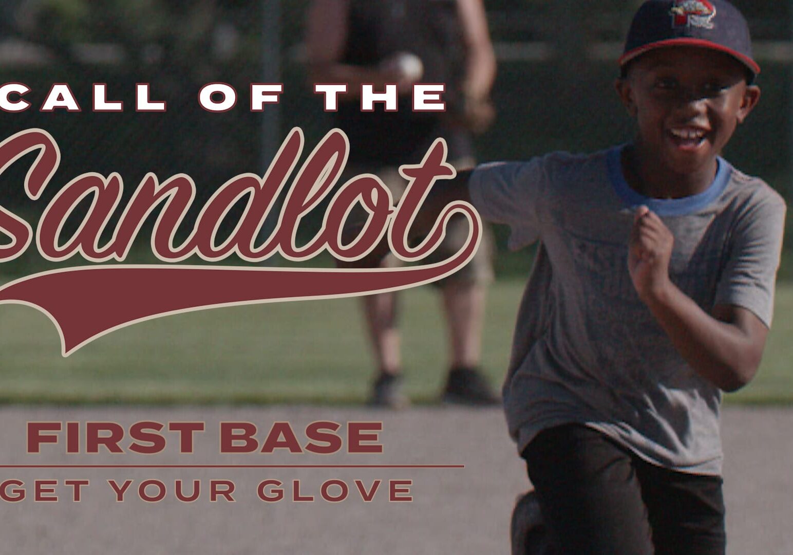 A little leaguer runs to first base for Call of the Sandlot