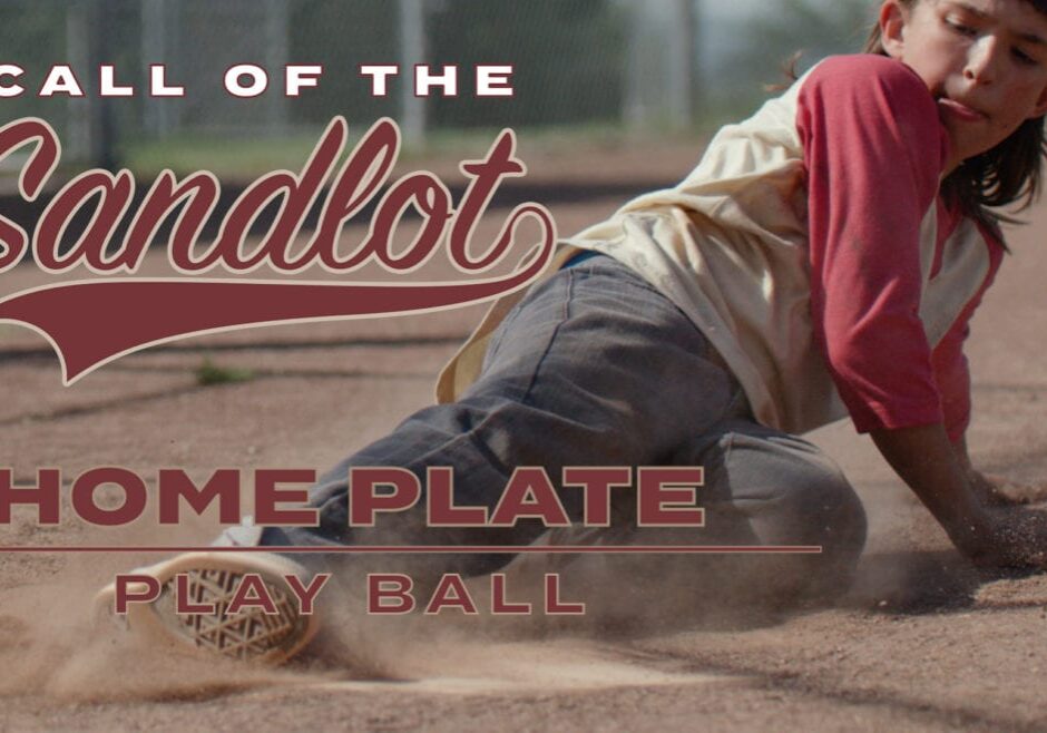 A baseball player slides into home plate for "Call of the Sandlot."