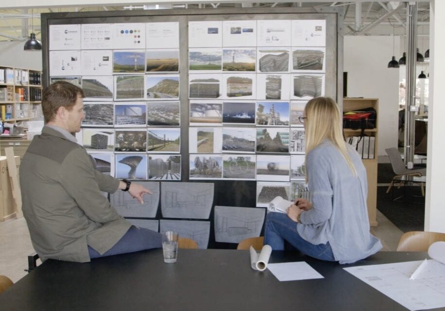 Two individuals sitting.