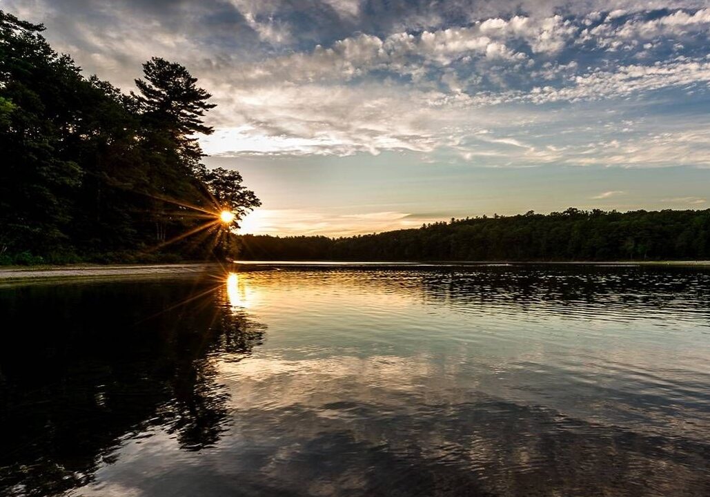 Walden Pond at sunset in Concord, Massachusetts.