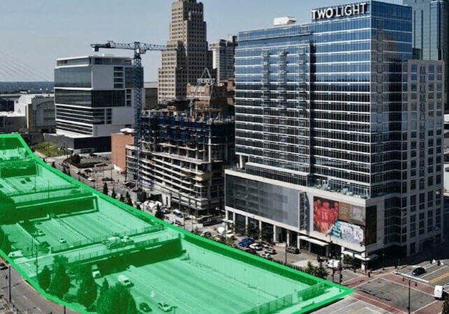 Rendering shows the four blocks of the downtown freeway loop that would be covered with a deck that would create a public space.