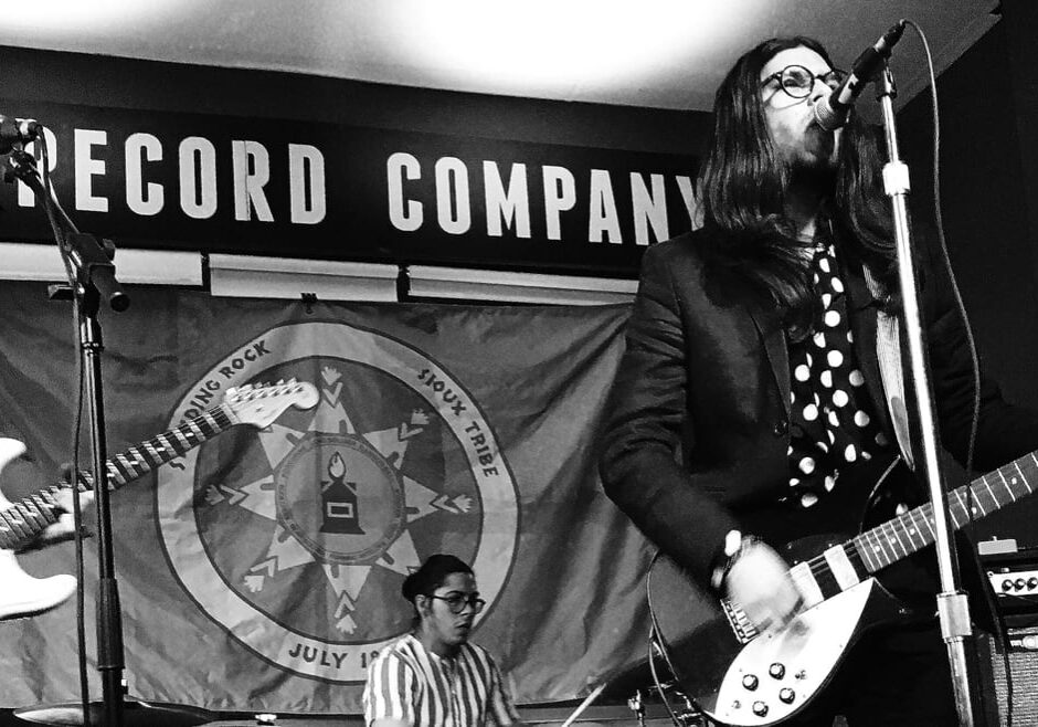 musicians playing on stage