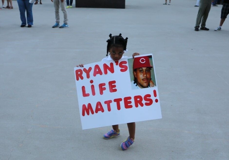Neriha Stokes, the daughter of Ryan Stokes, participated in a vigil for her late father Friday, July 24. Ryan Stokes was shot by an KC police officer on July 28, 2013.