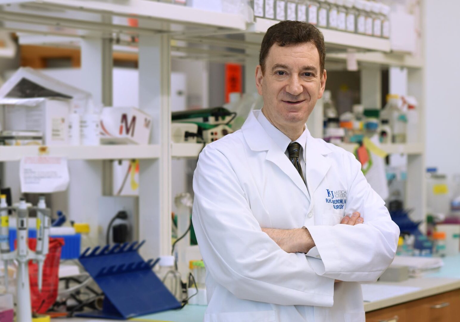 Dr. Russell Swerdlow, director of the Alzheimer’s Disease Research Center at the University of Kansas, in a laboratory setting.