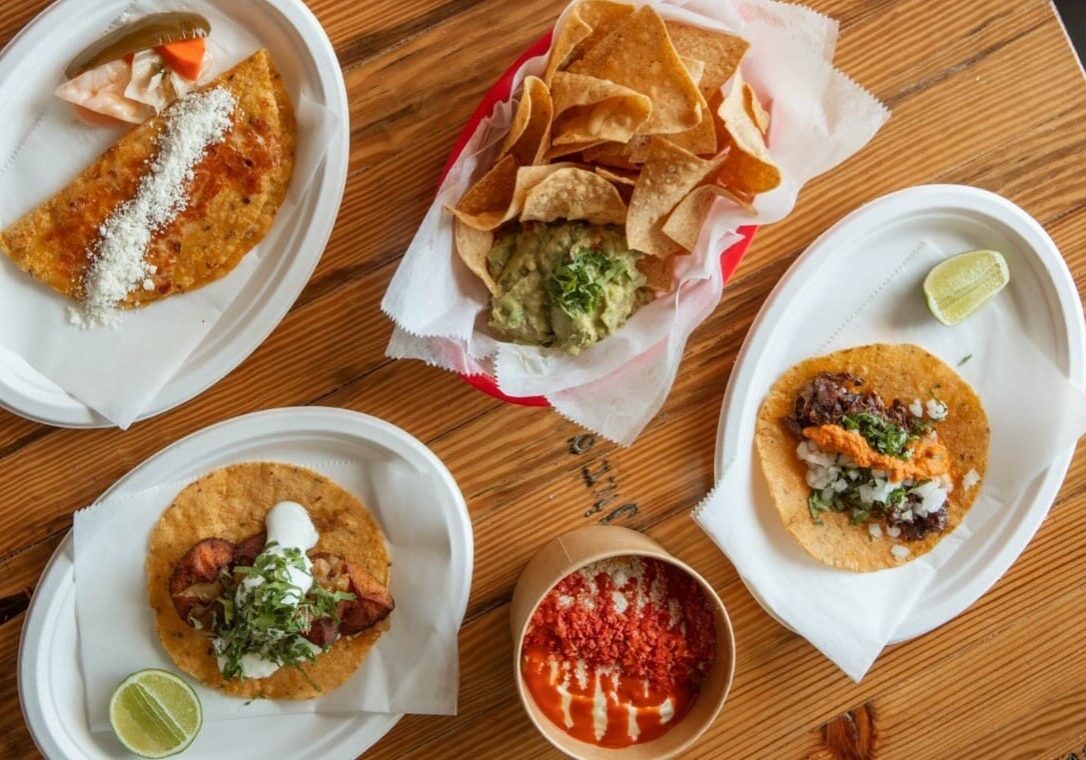 A variety of dishes from Tacos Valentina.