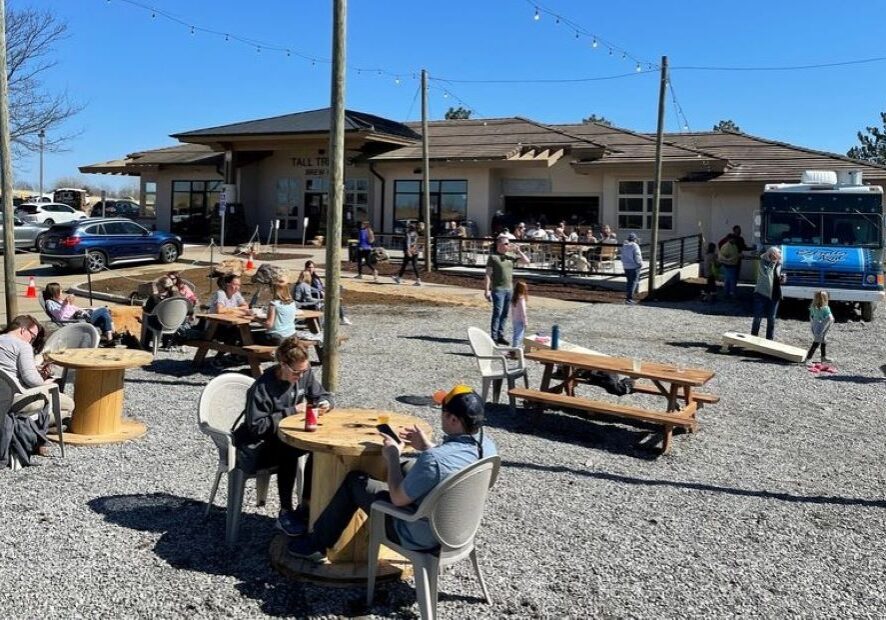Patrons enjoy the outdoor patio space at Tall Trellis in Olathe.