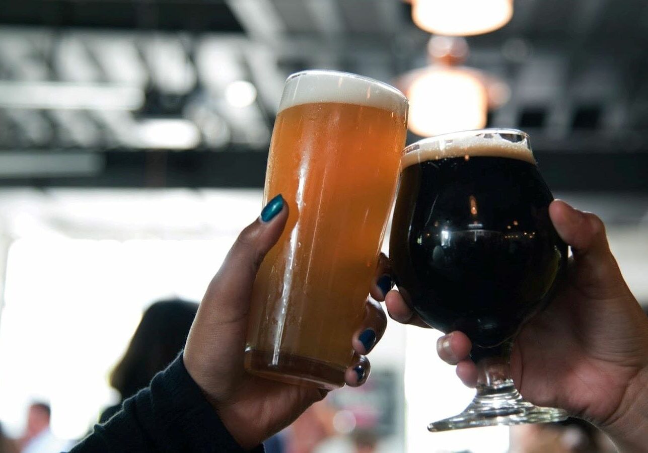 A toast featuring two beers.