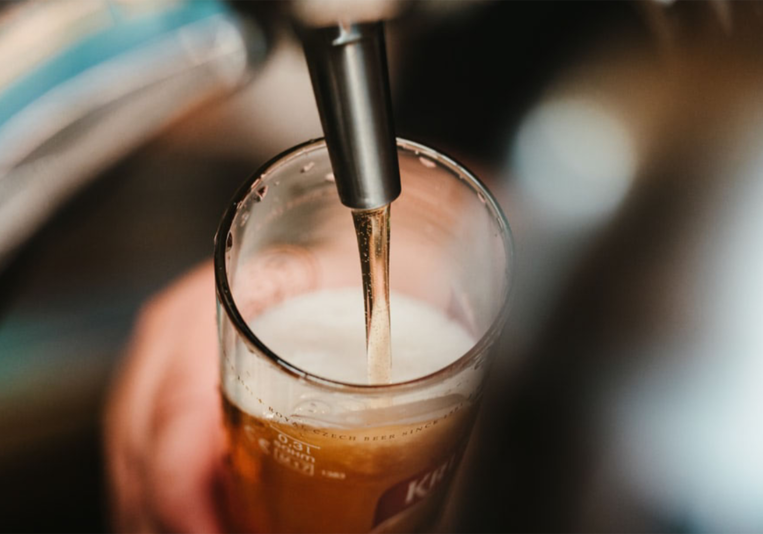 Beer pouring into a glass