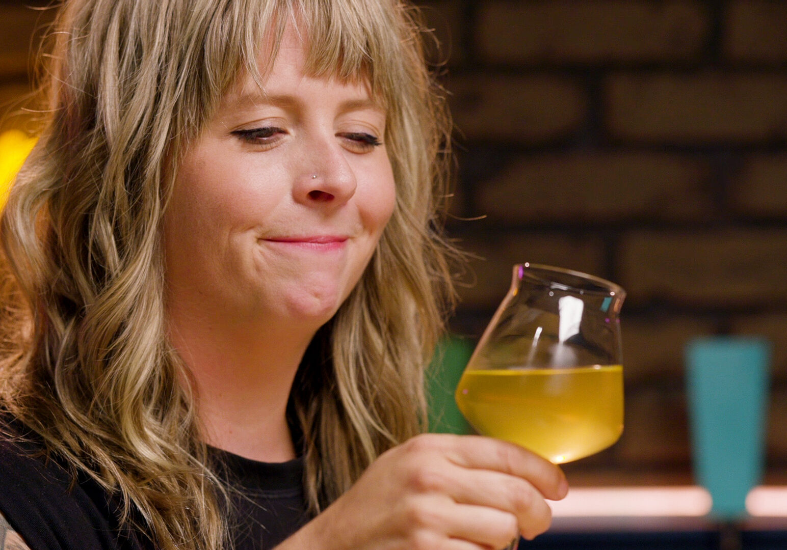 Flatland beer enthusiast Cassie Niemeyer taste tests three experimental Kansas City beers.